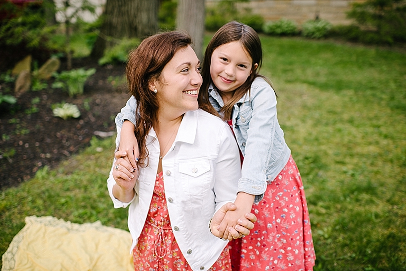 mom and daughter hugging each other