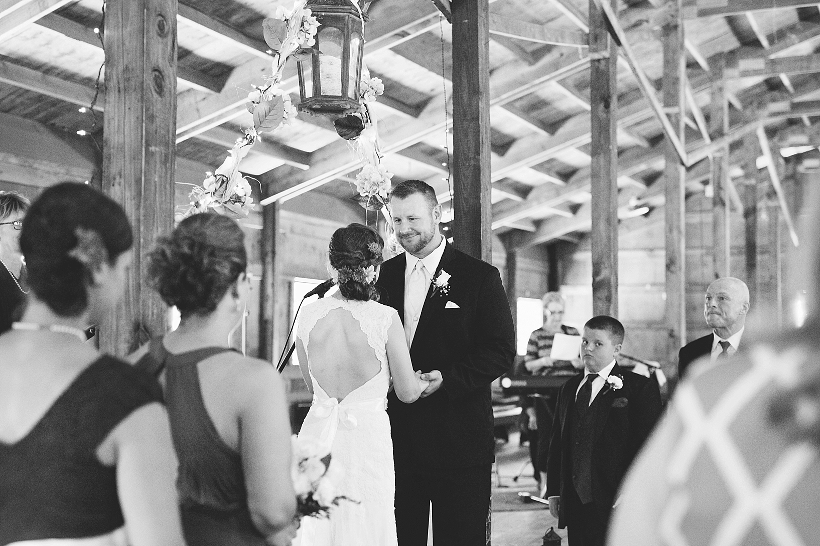 bride and groom standing at the altar