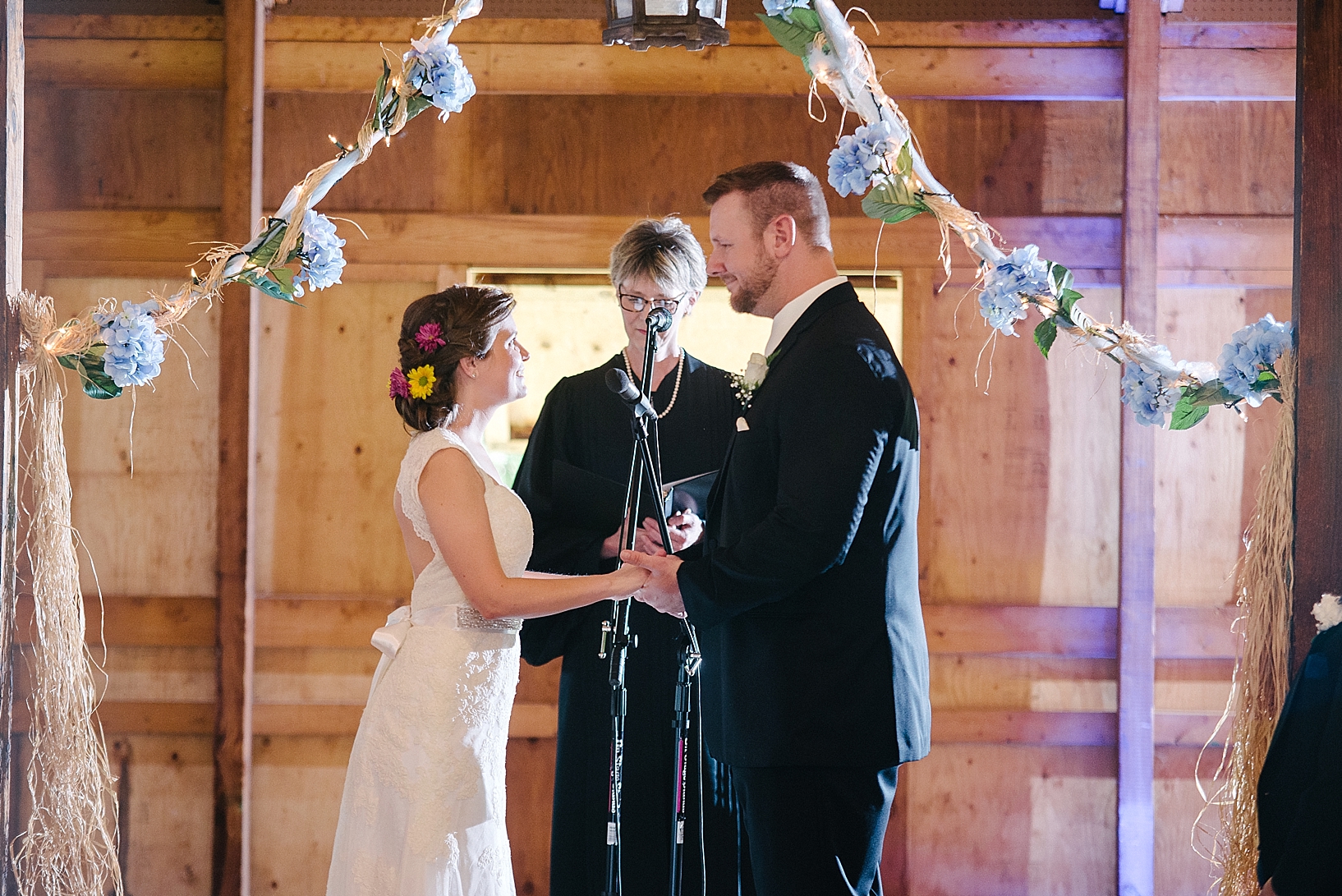 bride and groom standing at the altar