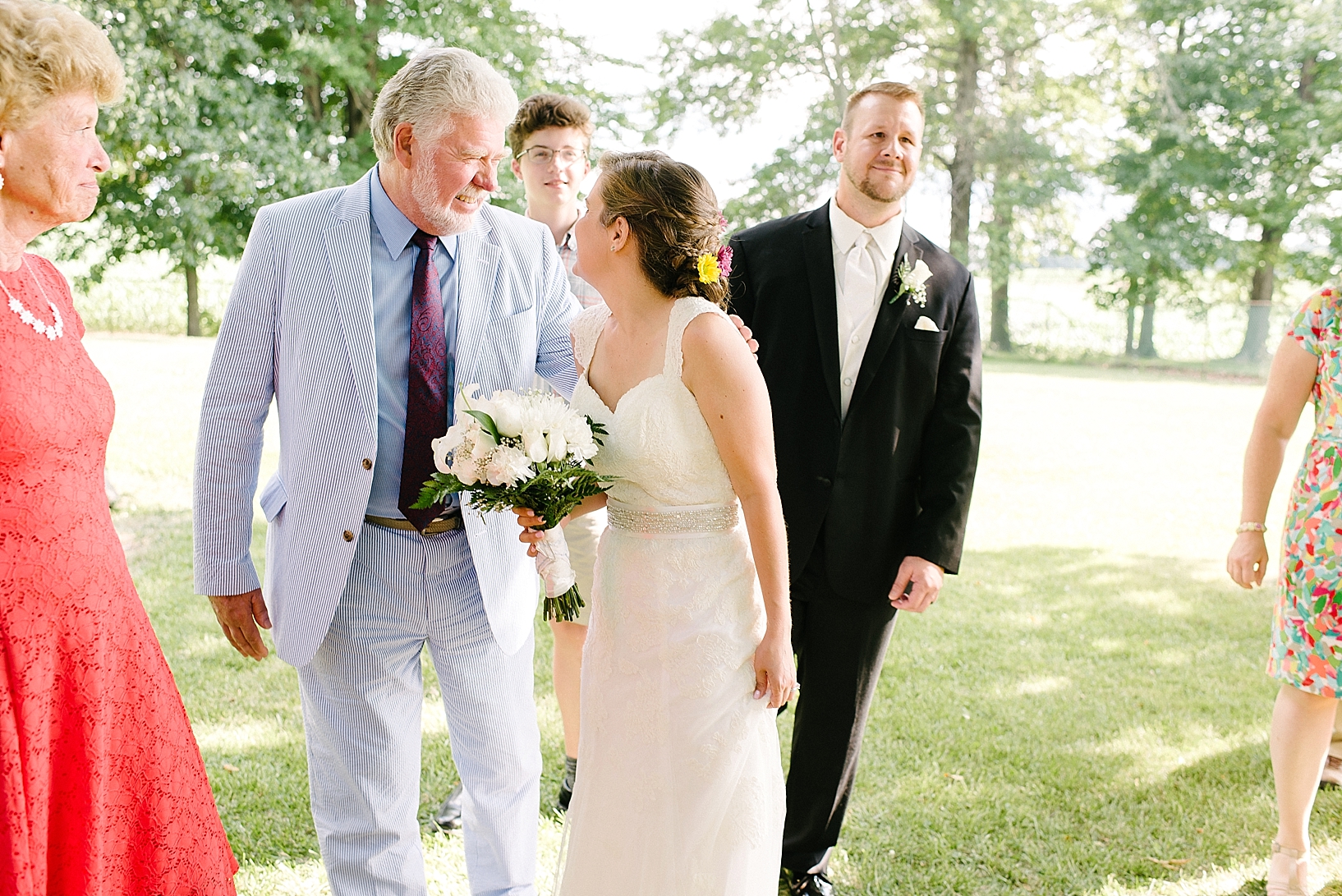 bride with family outdoors