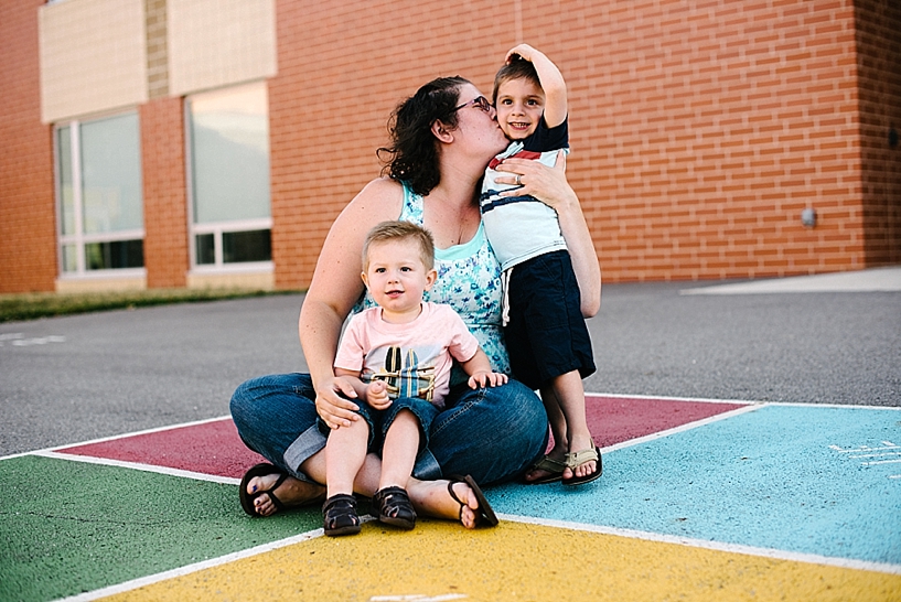 mom and toddler sons on playground