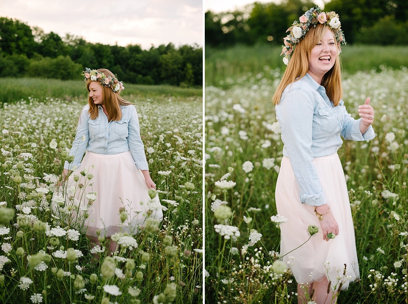 Redheaded woman wearing floral crown and tulle skirt standing in a field