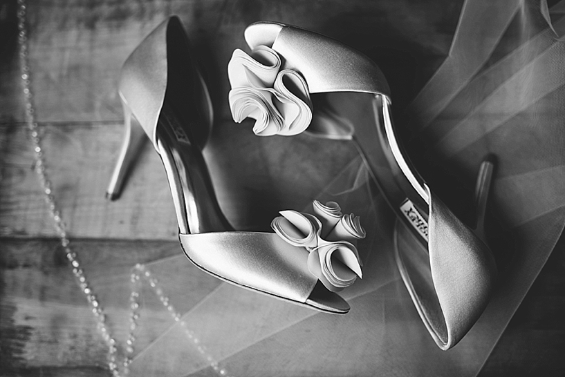 bride's high heels and veil