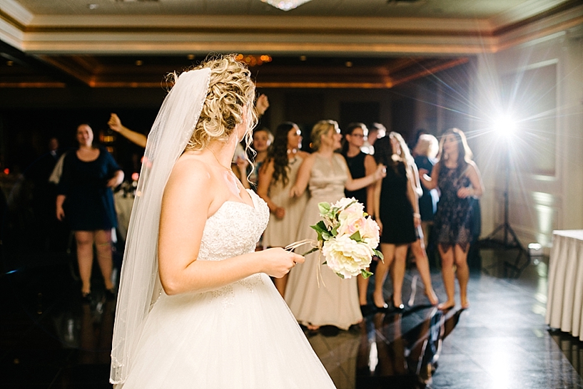 bride tosses bouquet