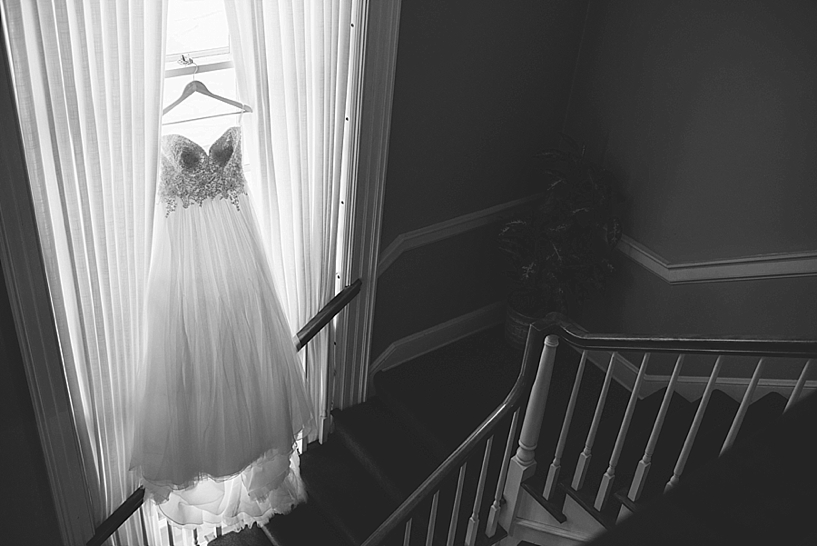 wedding gown hanging from church window