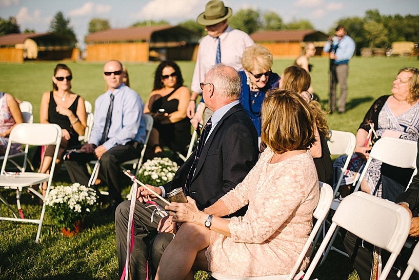 wedding guests find seats