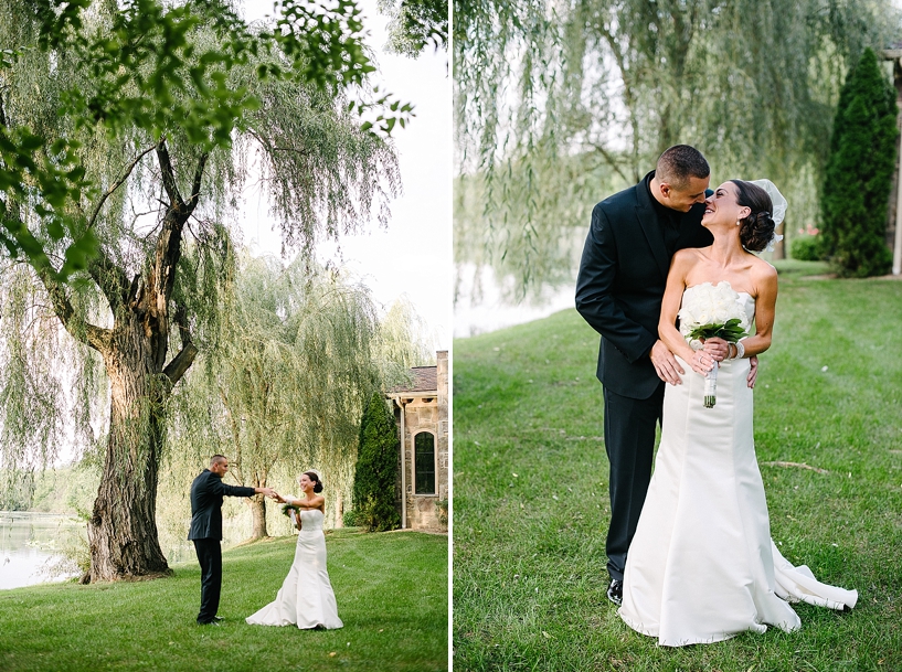 groom twirling bride under willow tree