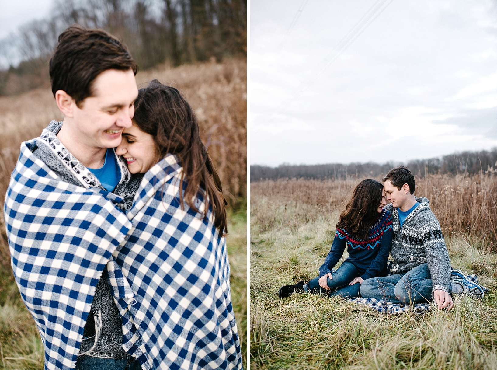 couple wrapped up in blue checked blanket with eyes closed laughing