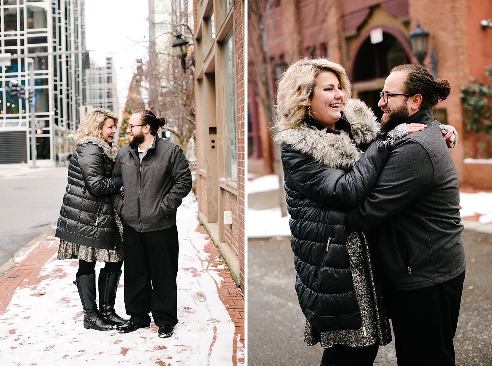 couple wearing winter coats standing on city sidewalk covered in snow