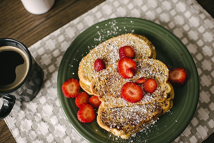 french toast with powdered sugar and strawberries