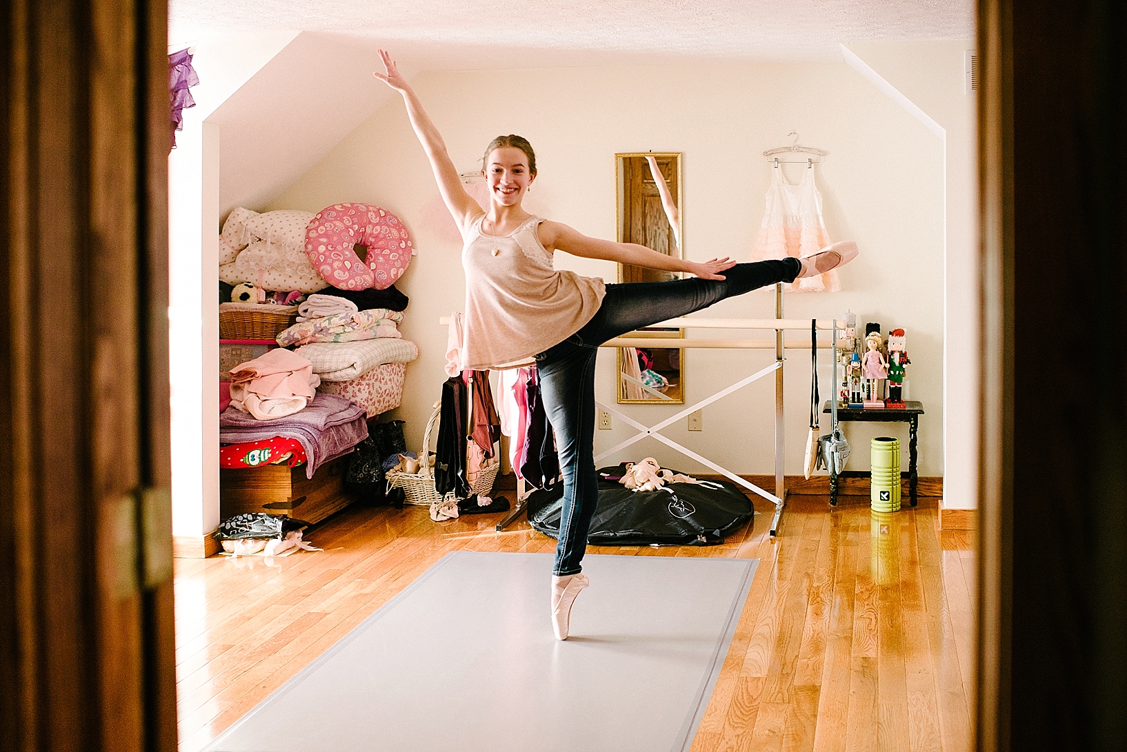 teen ballerina dancing in bedroom