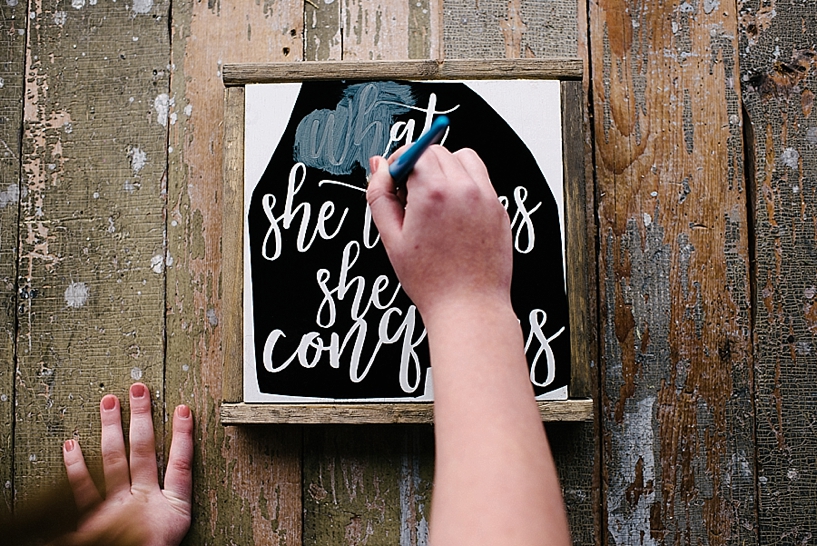 painting hand lettered milk paint sign