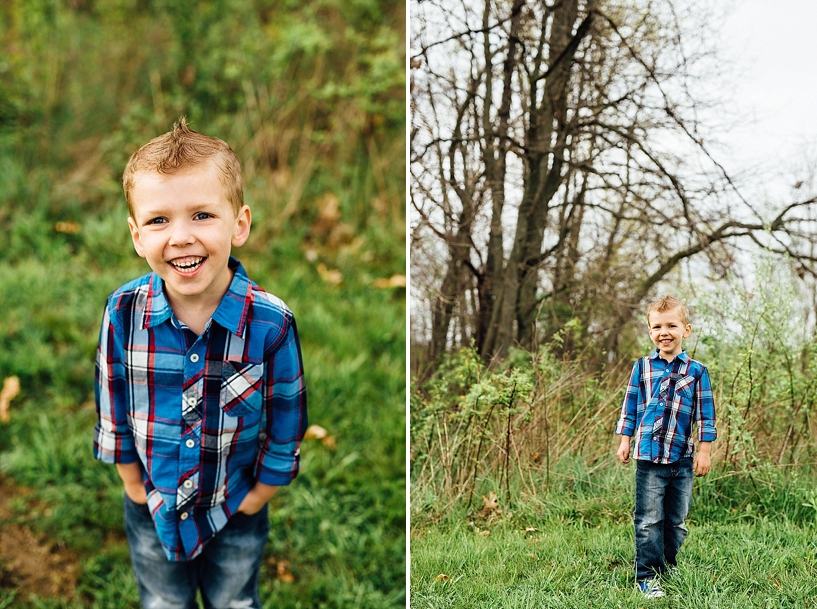 young boy with blonde spiked hair wearing jeans and blue and red plaid shirt