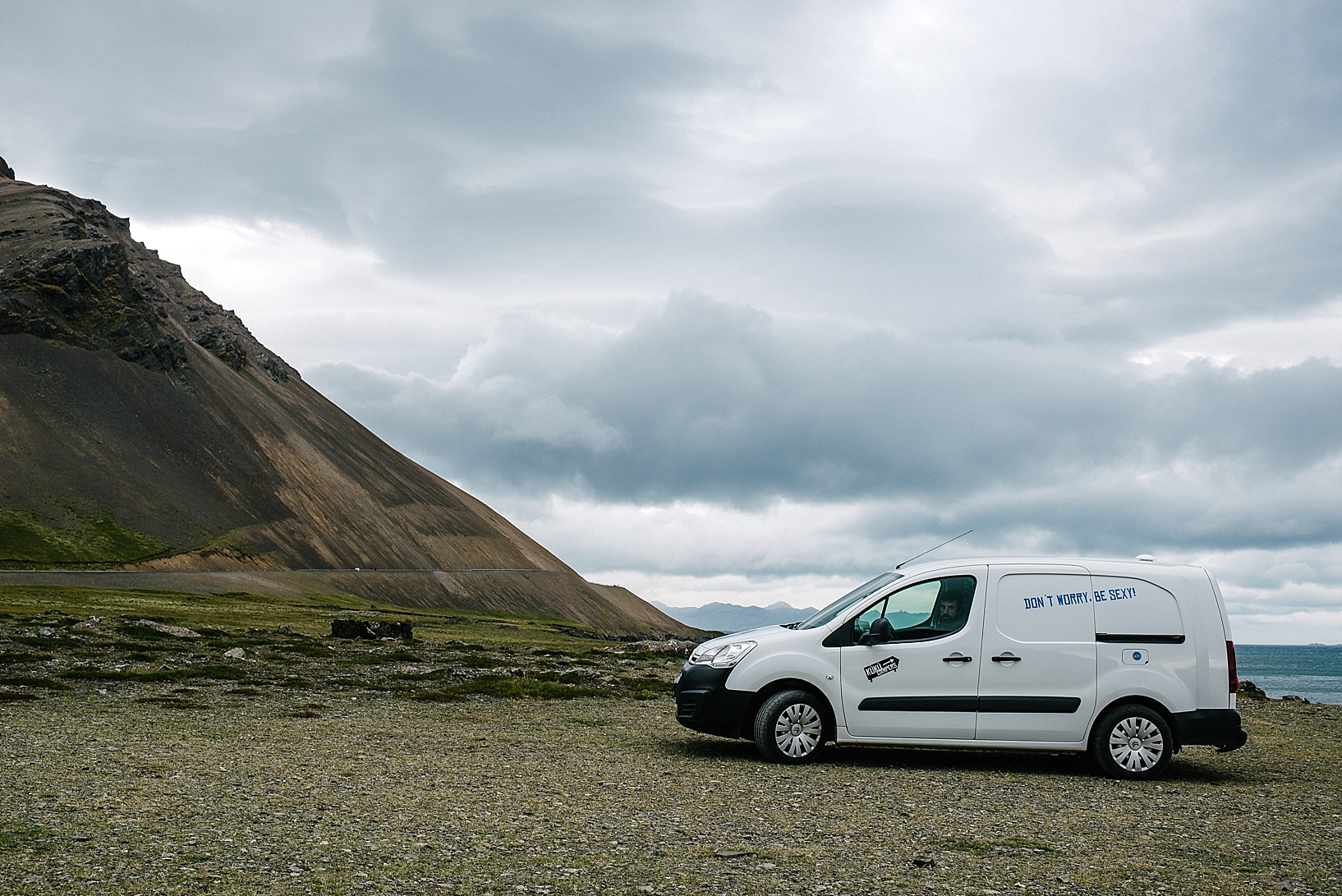 Kuku Camper parked along sea in Iceland
