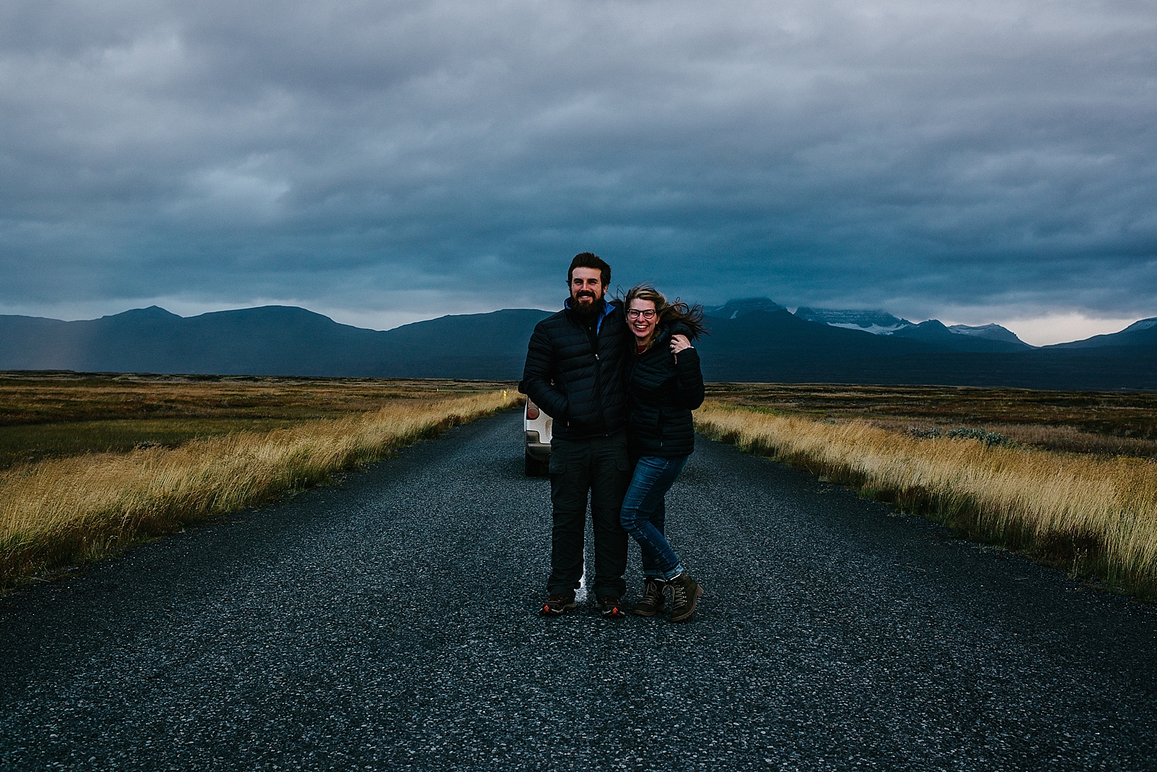 couple standing on Ring Road in Iceland