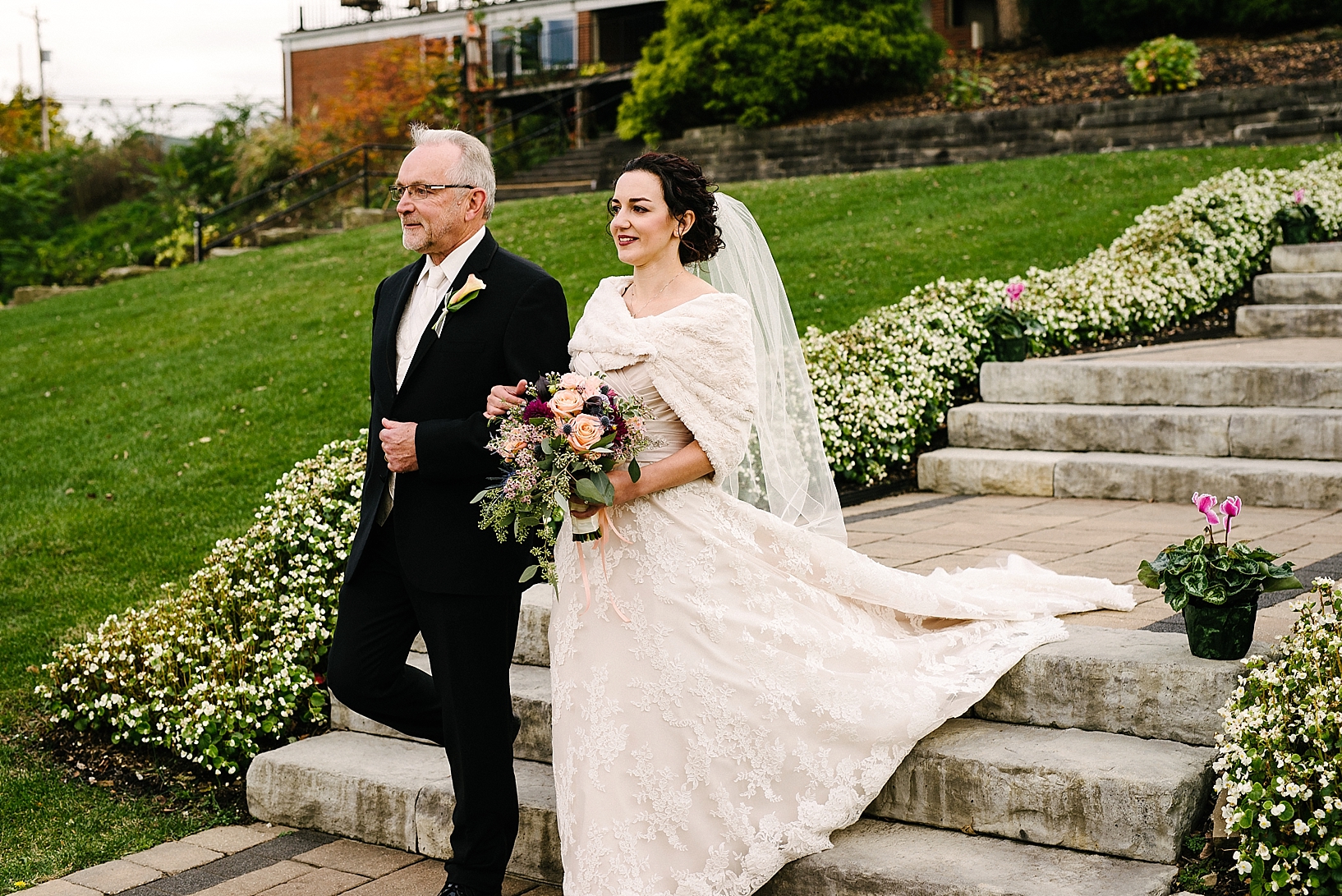 father escorting bride down aisle at outdoor ceremony at The Overlook 