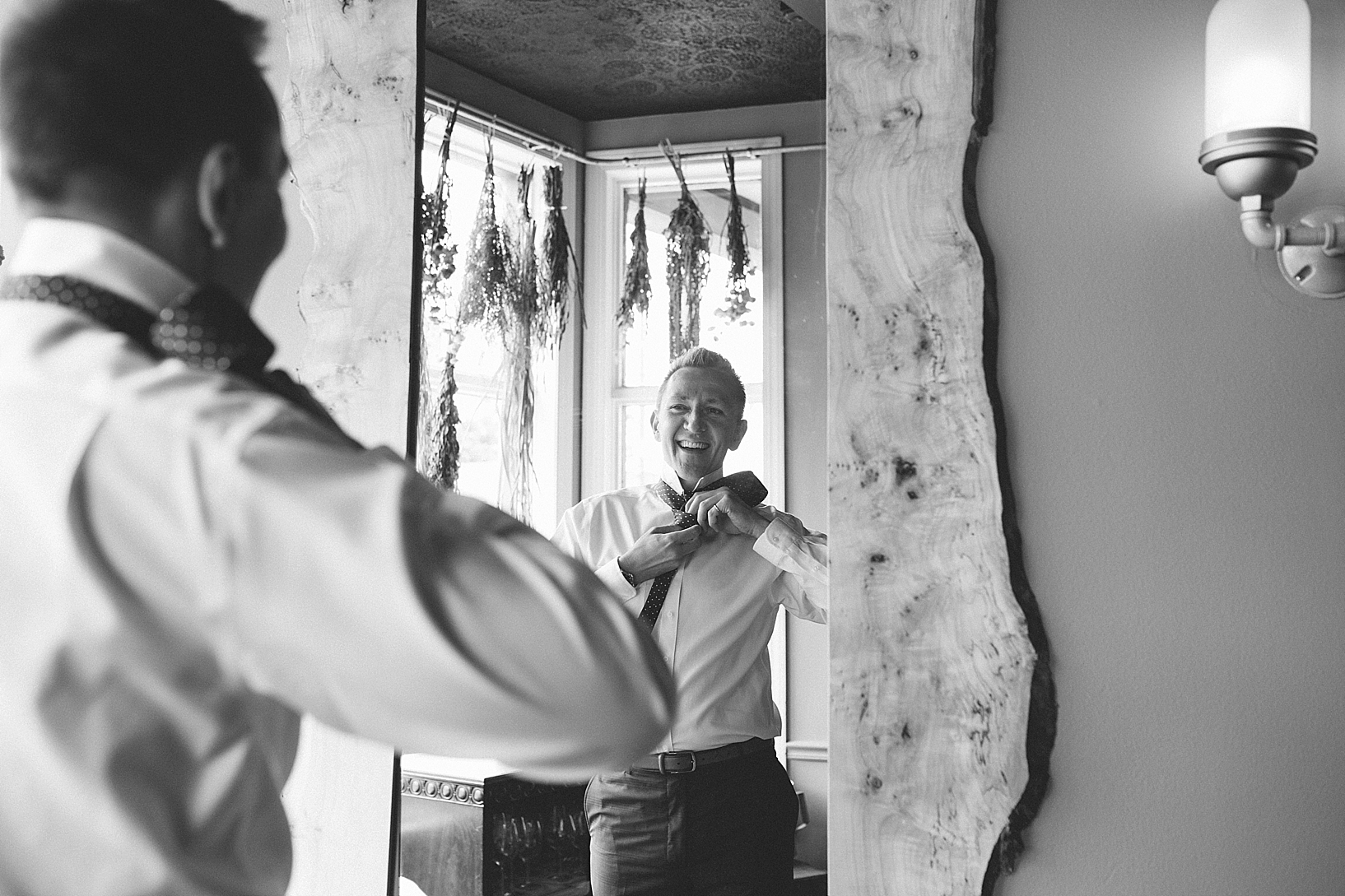 groom getting dressed for wedding day Cleveland OH