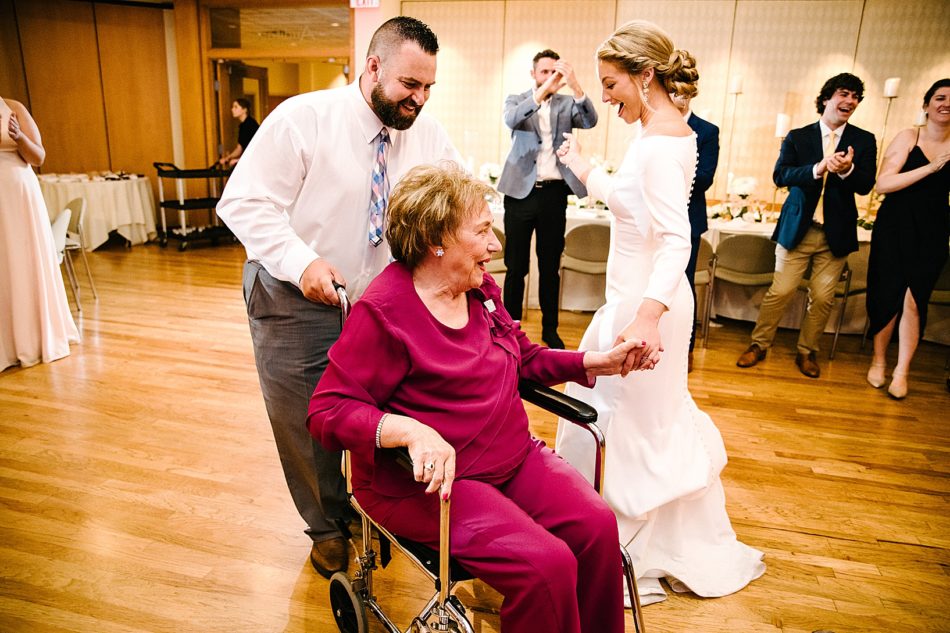 Bride dances around grandmother in wheelchair