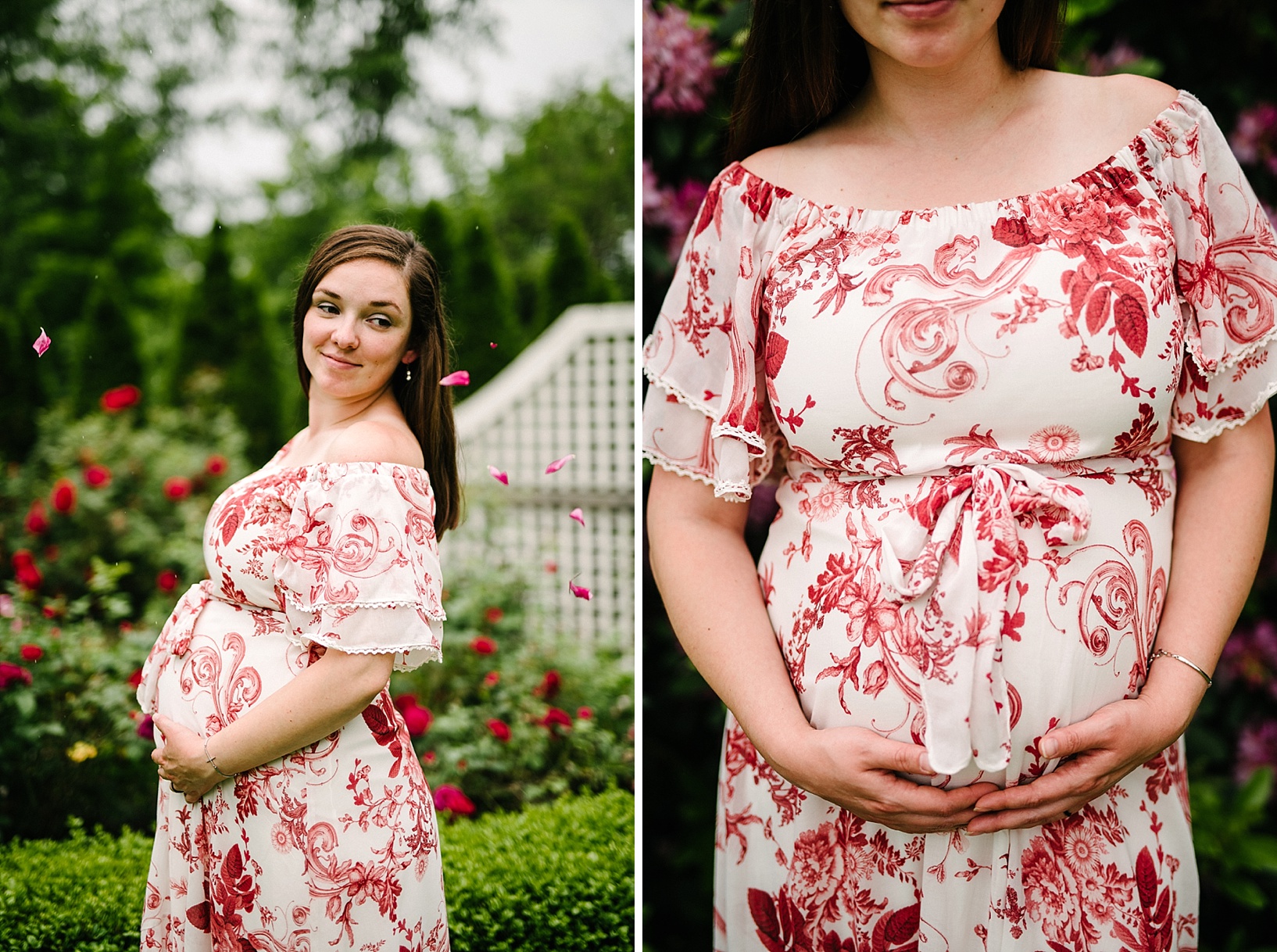 Pregnant woman in white and red floral dress holds her belly