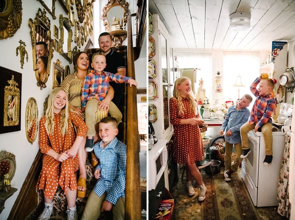 Family of five sits on staircase surrounded by antique gold mirrors during quirky family session