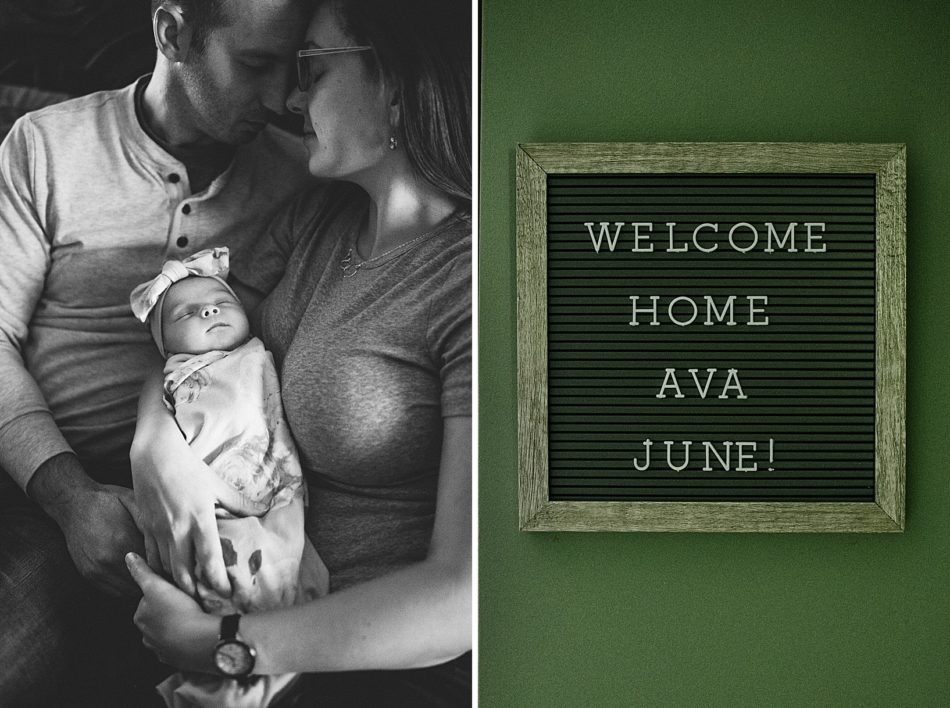Woman and man touch foreheads while holding their newborn baby with sign that says "Welcome Home Ava June!"