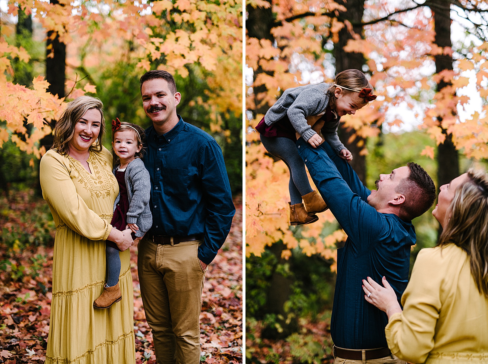 Blonde woman in mustard colored dress claps and laughs as man lifts their daughter up into the air in front of gorgeous fall foliage.