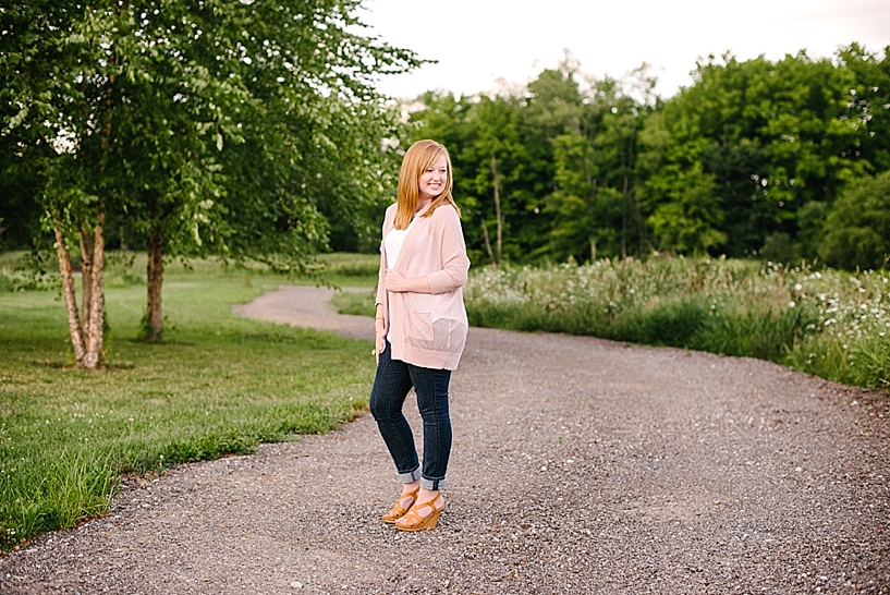 Redhead standing on a country lane