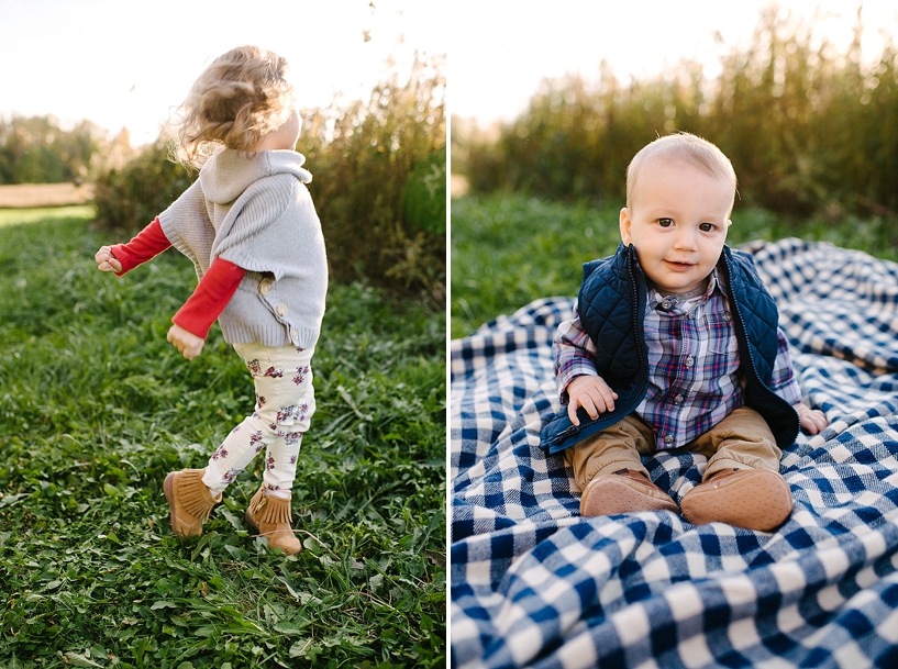 little girl wearing moccasins dancing by field and baby brother sitting on blanket