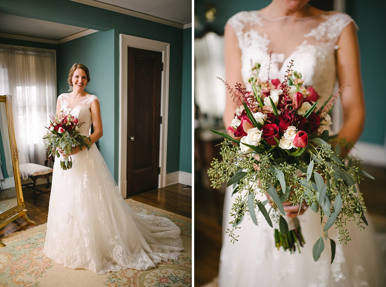 bride in lace wedding gown standing in bedroom holding bridal bouquet with red roses
