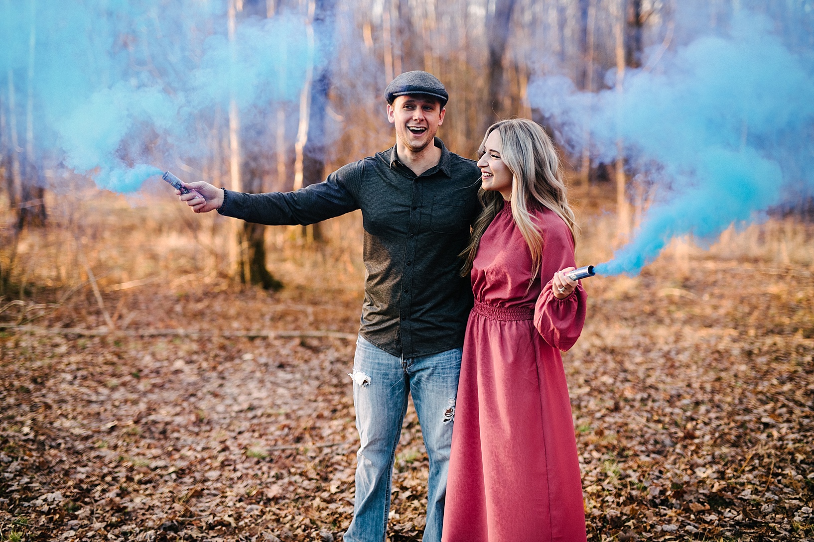 gender reveal with smoke bombs