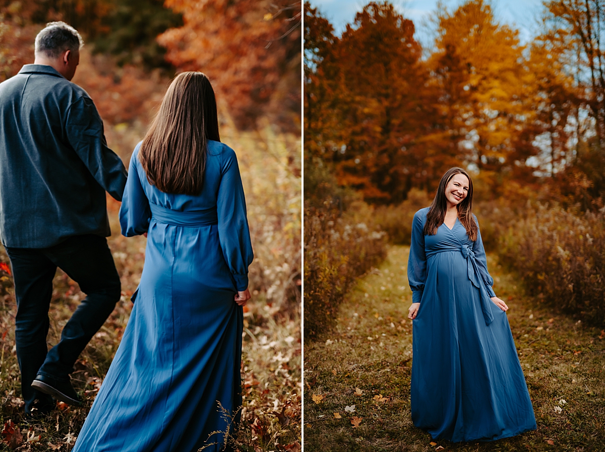 pregnant woman in slate blue dress in fall foliage