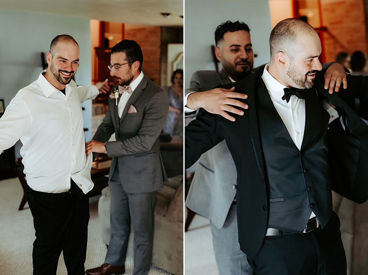 groom getting dressed on wedding day