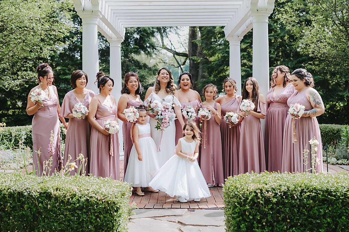 bride and bridesmaids portraits at Poland Town Hall with flower girls