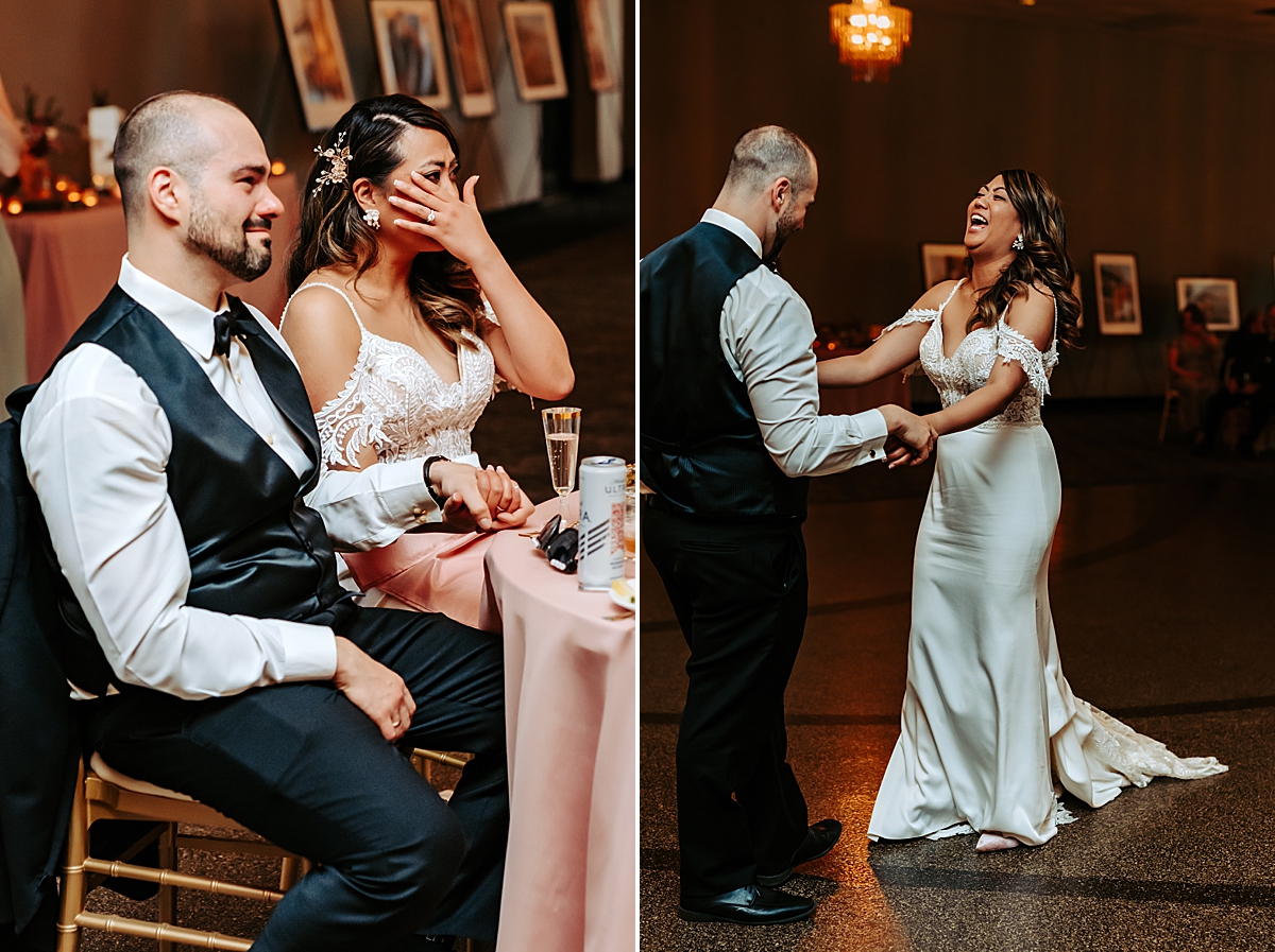 bride wiping tear from eye during toasts at wedding reception