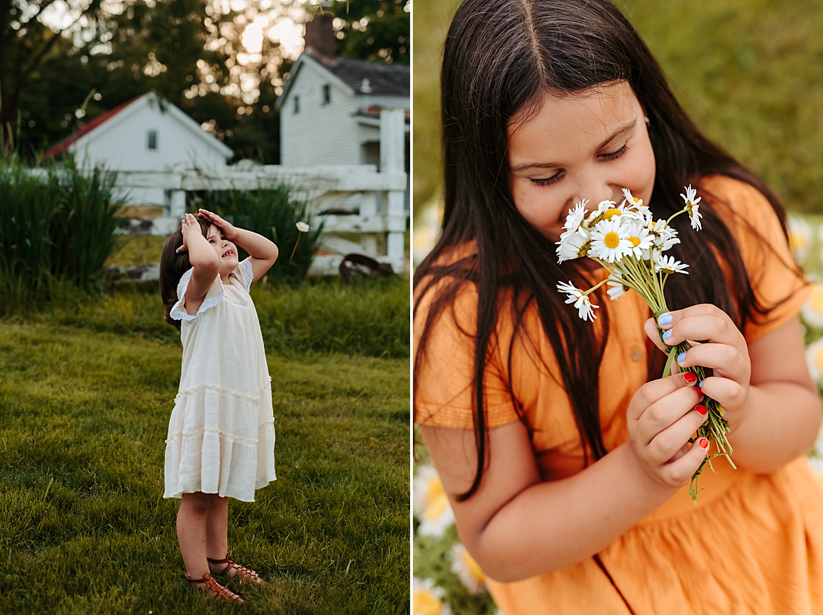 Left photo: A young girl in a white dress stands on the grass, looking up with her hands on her head. Right photo: A young girl in an orange dress holds a bouquet of daisies close to her face, smelling the flowers, with more daisies and greenery in the background.