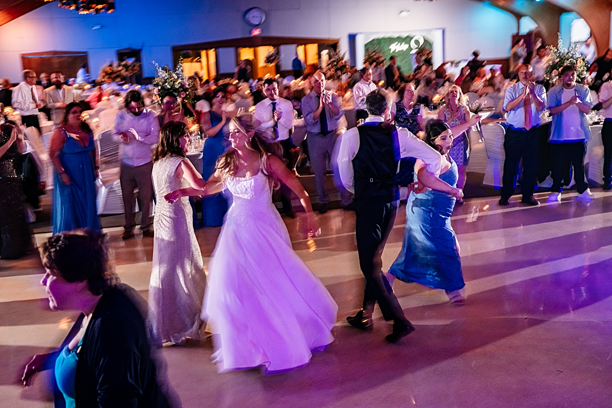 guests dancing on the dance floor at wedding reception